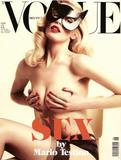 Claudia Schiffer topless (covered) in German issue of Vogue Magazine 