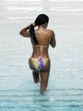 Melanie Brown shows her body in bikini by the pool in Miami
