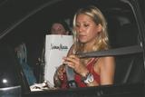 Anna Kournikova in a sexy red dress enjoys a night out in Miami Beach