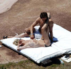 Sharon Stone topless @ the beachf67oo027o2.jpg